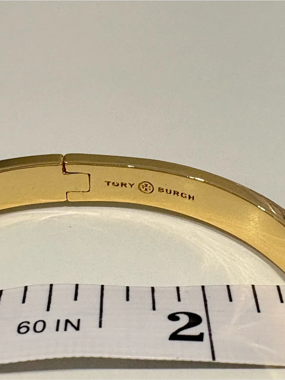 Tory Burch Gold-Tone Bangle with Cream Enamel Logo
